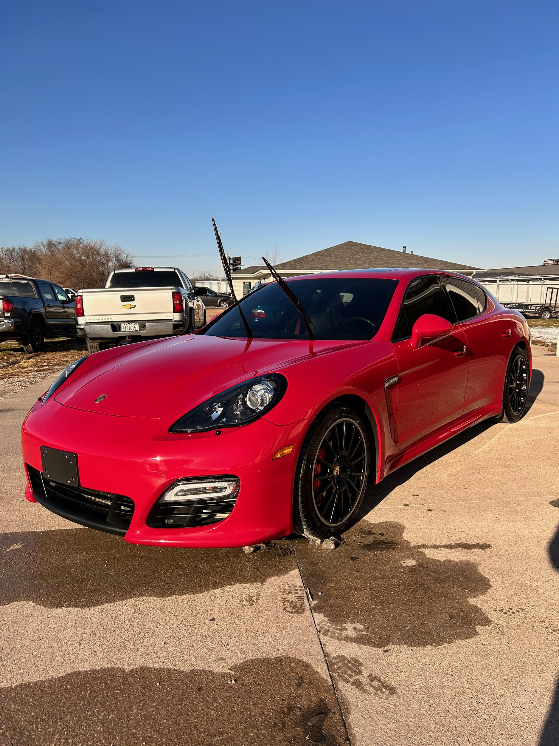 Red Porsche Panamera exterior detail work